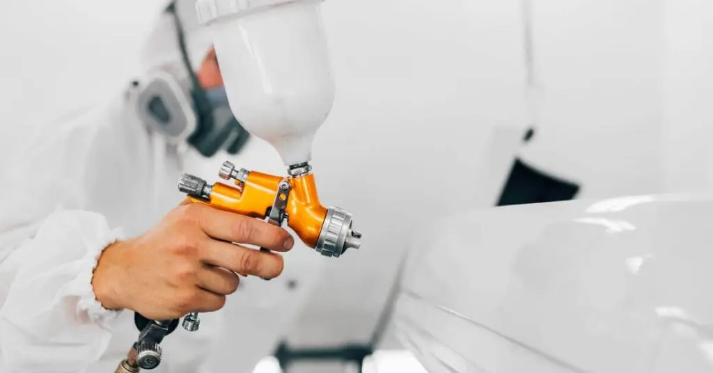 Spray painting a car