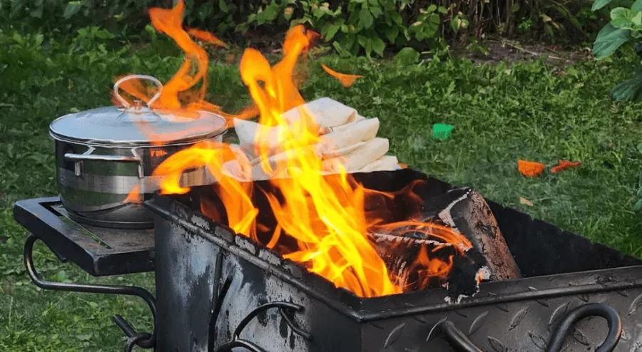 Wood burning in a grill