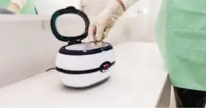 What solution to use in an ultrasonic cleaner