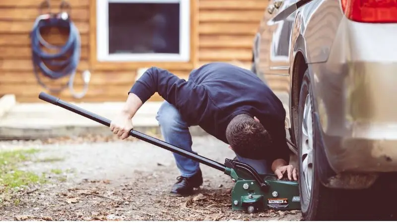a step-by-step guide on how to release a car jack