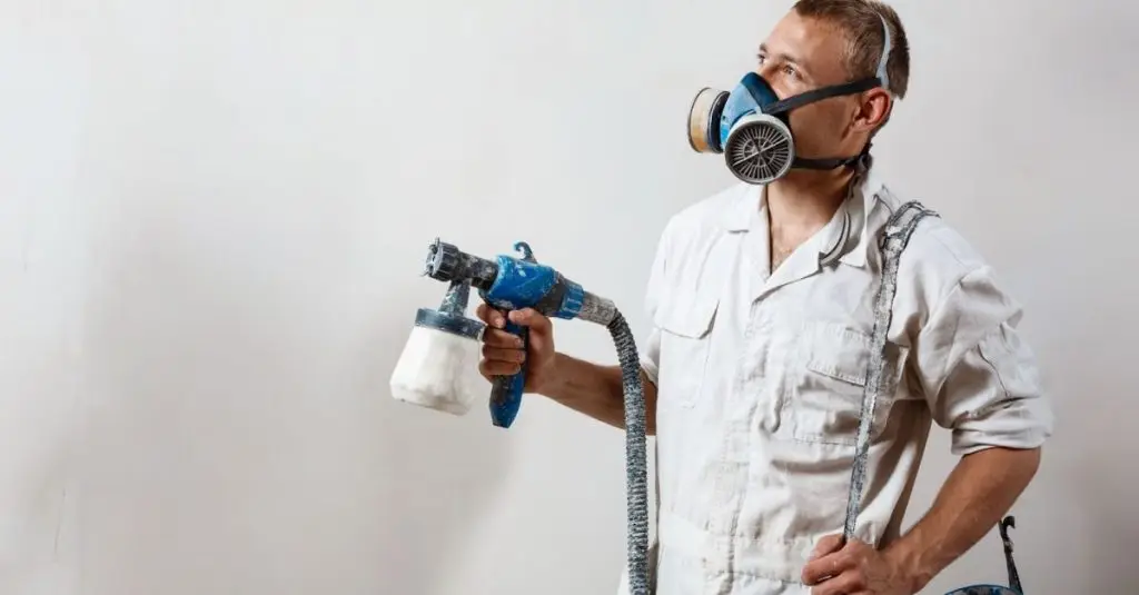 paint ceiling with spray gun