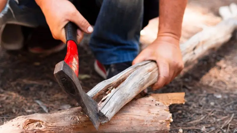 cutting wood with a hammer 