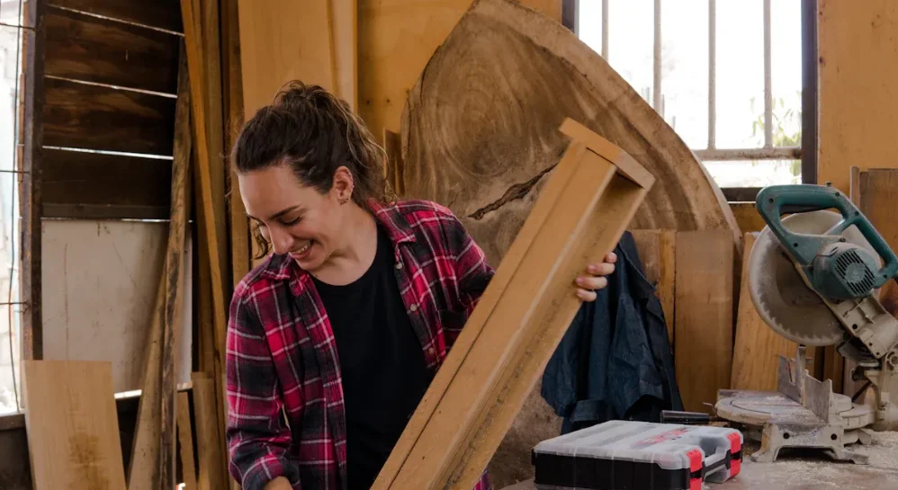 A woman handling woodwork