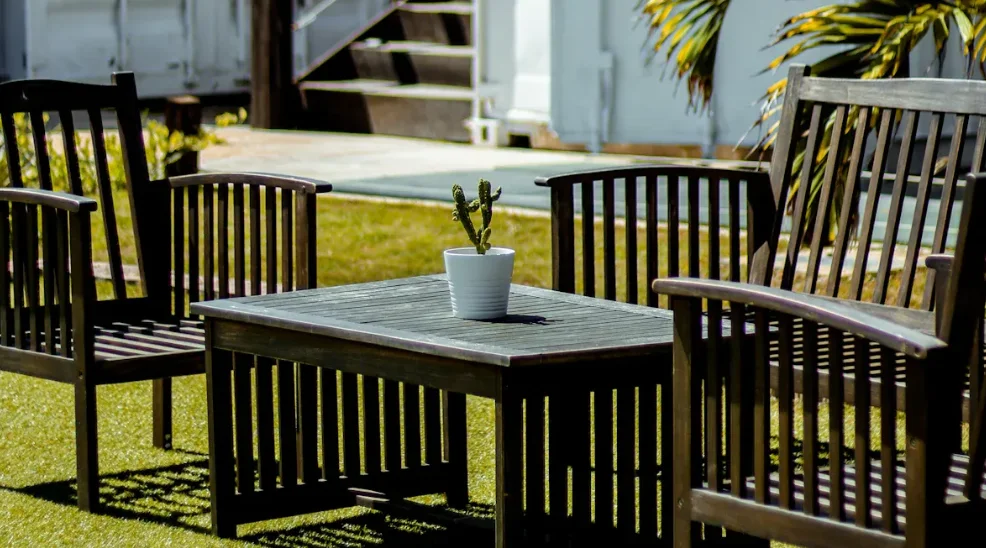 Wooden chairs in backyard