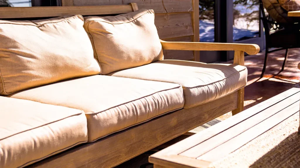Wicker furniture sofa outdoors in sunlight
