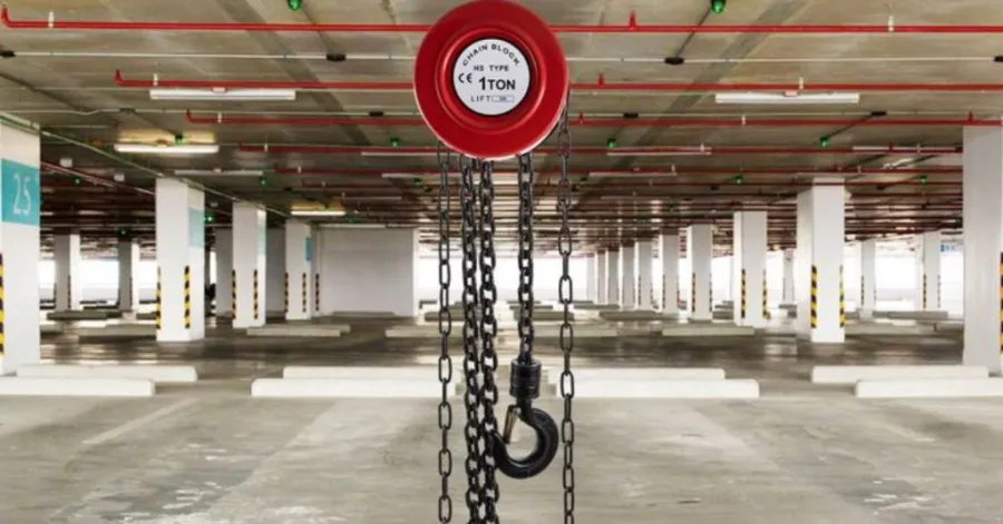 What do all chain hoists use to lift heavy loads