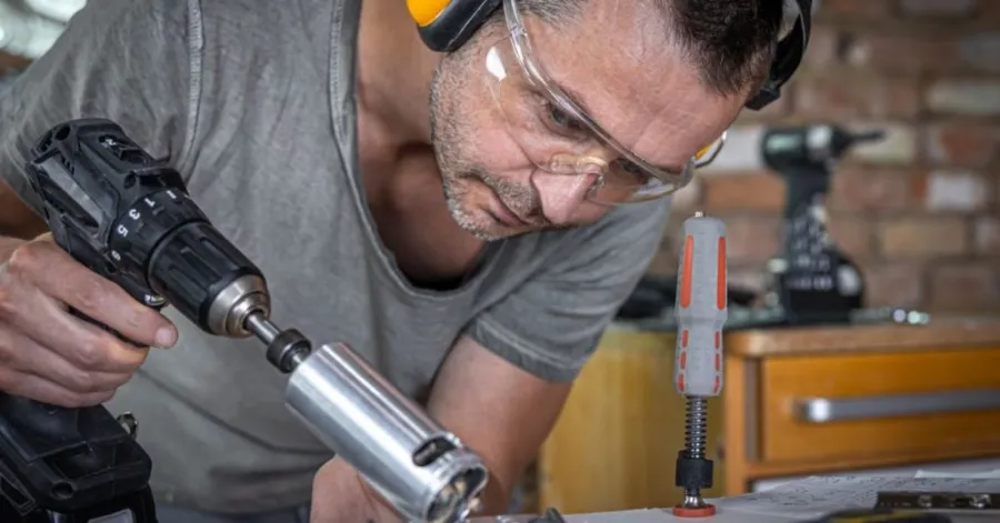 What is a portable drill used for