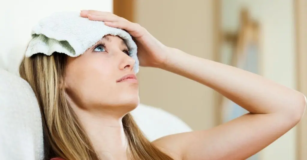 warm or cold towel for headache​