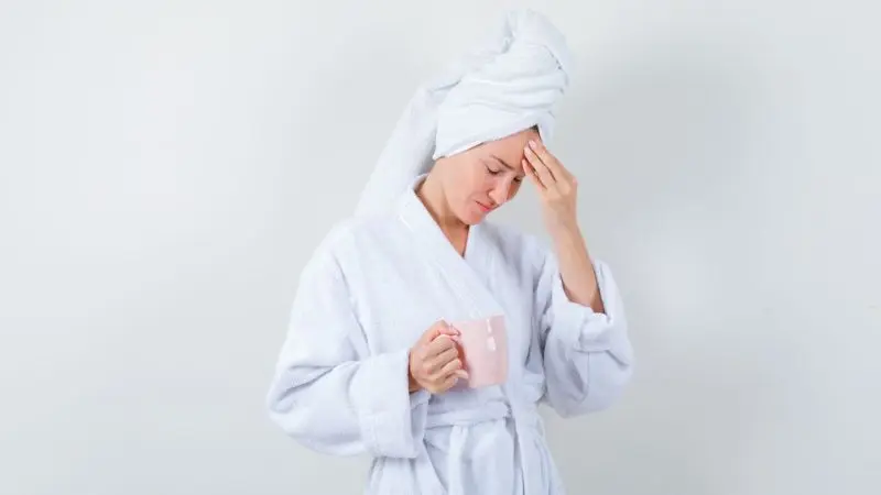 warm or cold towel for a headache