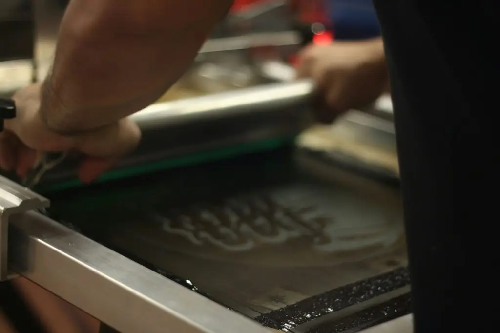silk screen printer being used