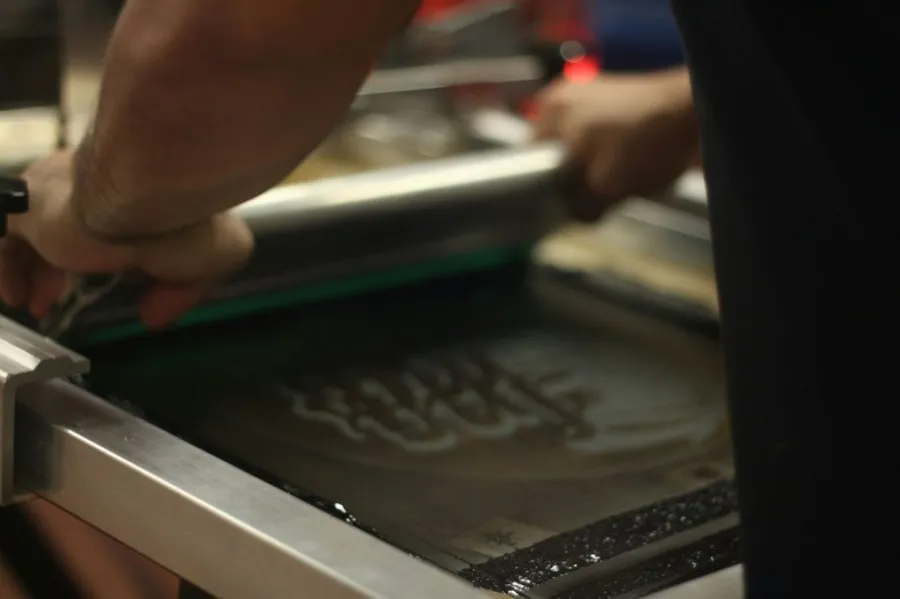 silk screen printer being used