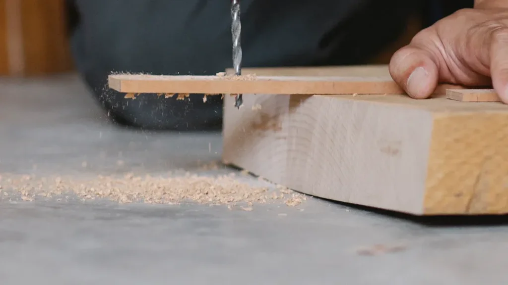 person using a pocket hole jig