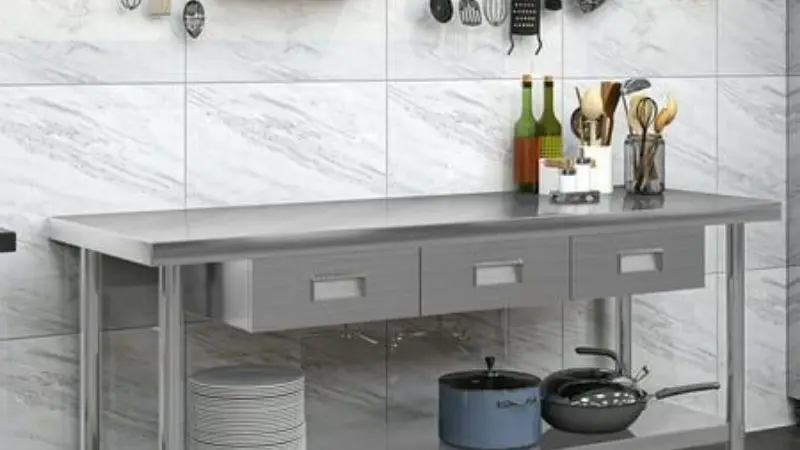 Stainless steel table for a commercial kitchen