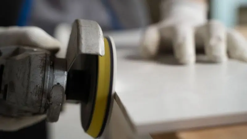 How to reduce dust while cutting concrete board