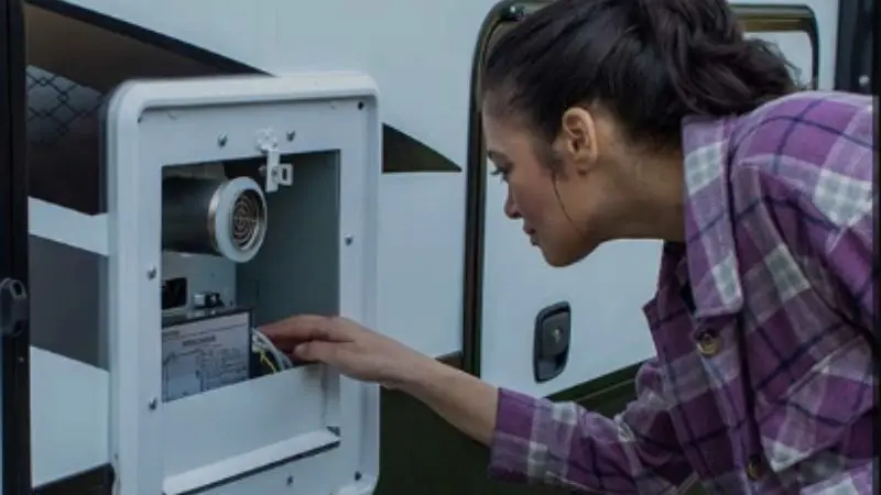 When to call a professional for RV water heater repairs