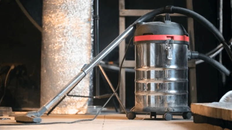 Wet Dry vacuum cleaner placed in a workshop