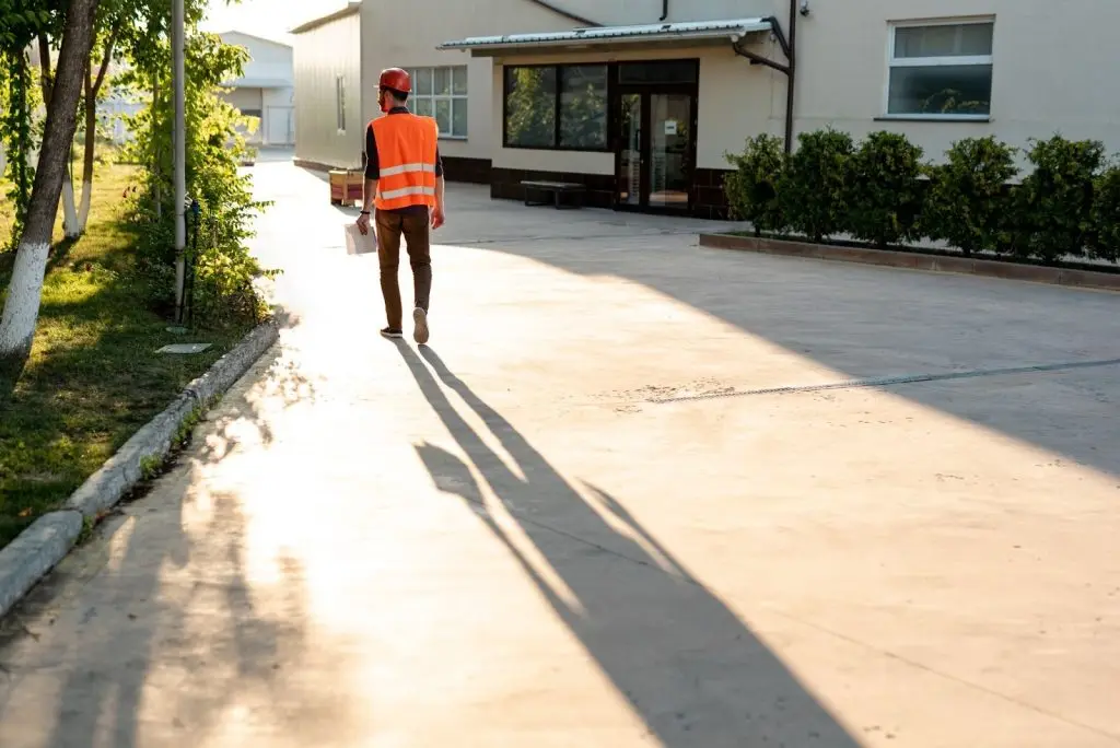 Man walking on clean pavement