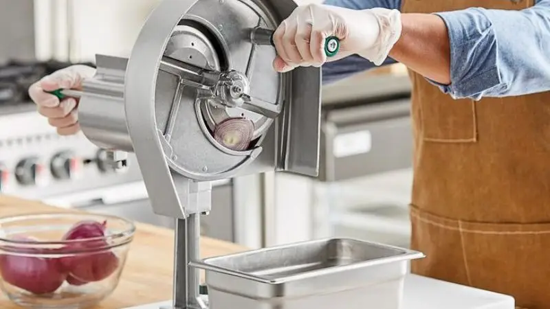 Safely use a commercial vegetable slicer