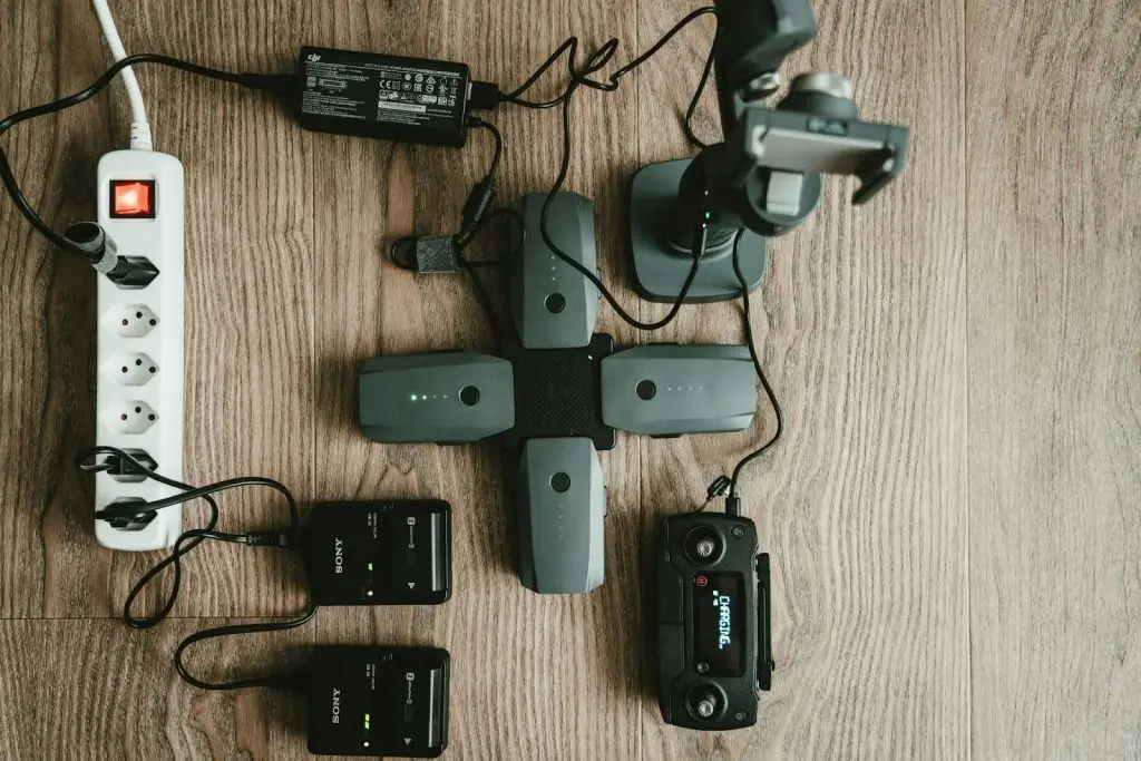 Dual voltage devices such as drones and camera gear charging via power strip