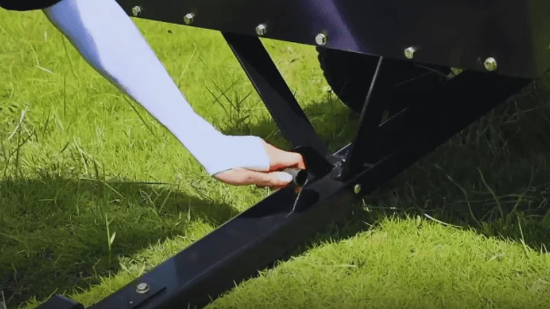 person operating the hand & foot pedal on your ATV Trailer