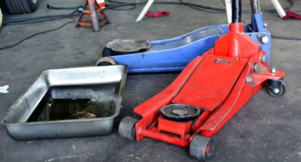 how to add hydraulic fluid to a floor jack
