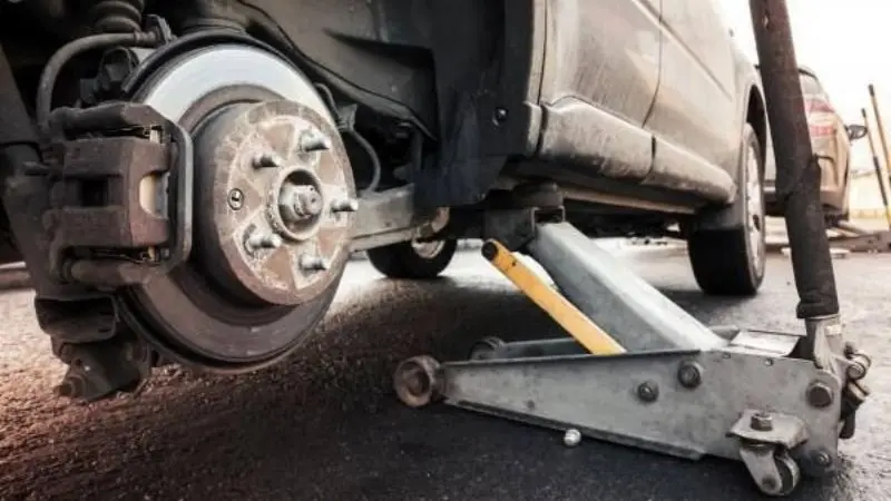 Use a jack to lift up your car
