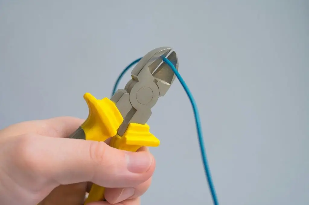 use of tools for installing electrical outlet