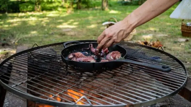 Steel fire pit cooking grate