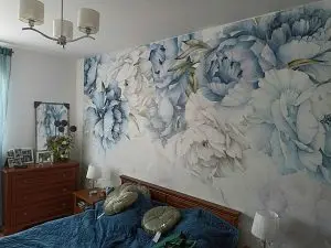 soft mural design behind the bed