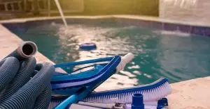 how to clean sand filter pool pump