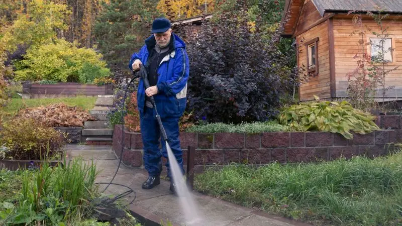 Use a hose reel for faster pressure washer cleaning