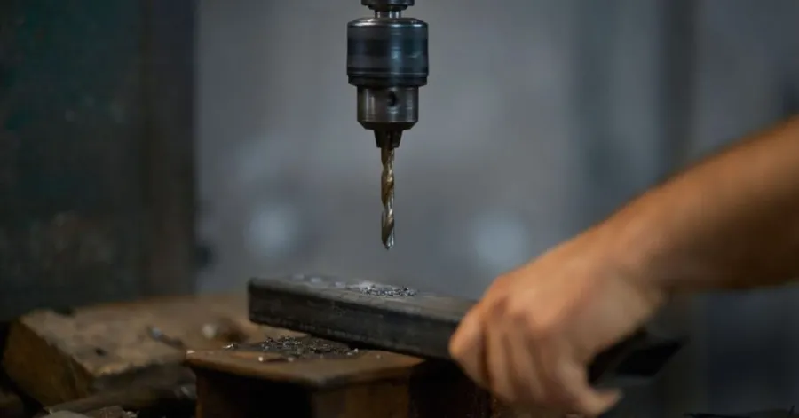 how to drill a hole in metal​