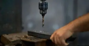 how to drill a hole in metal​