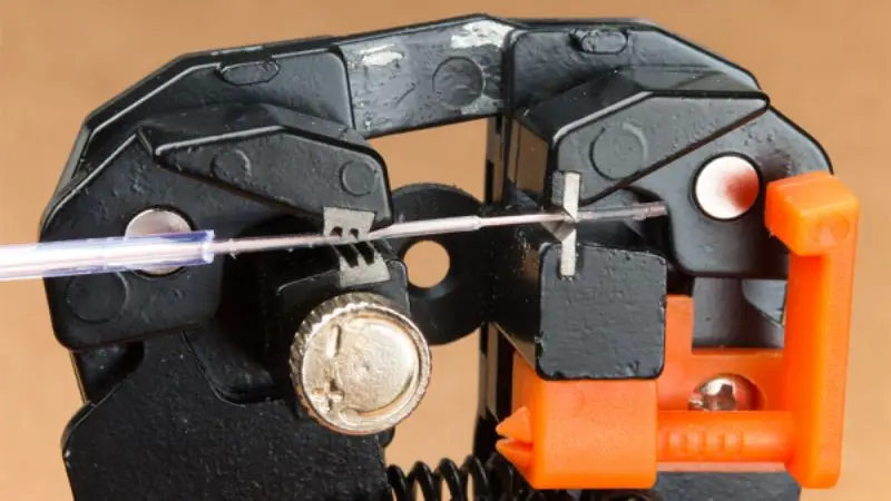 Self-Adjusting Wire Stripper