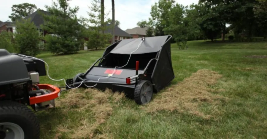How does a lawn sweeper work​