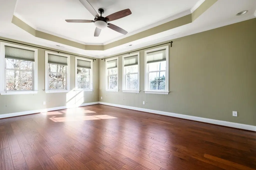 Ceiling fan with sunlight in the room