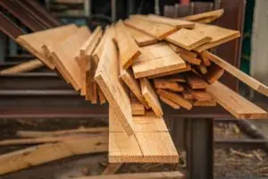 stacked lumber in an outdoor setting