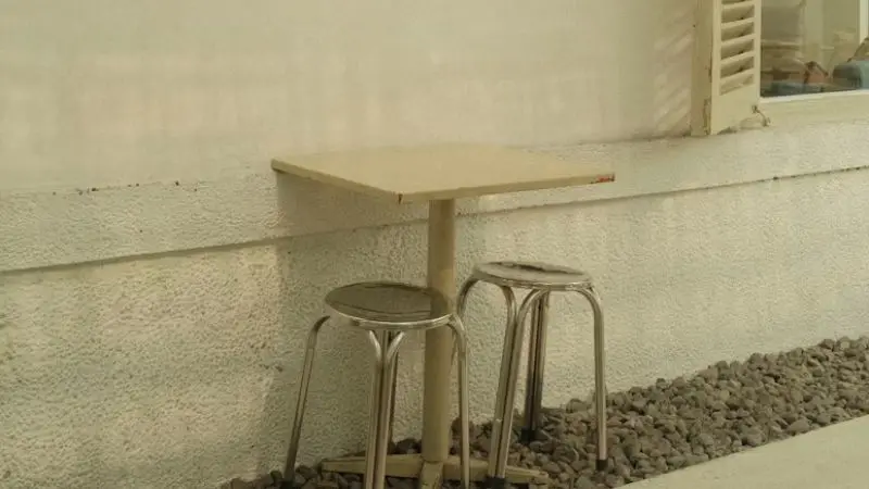 What is a bar-height outdoor prep table in stainless steel