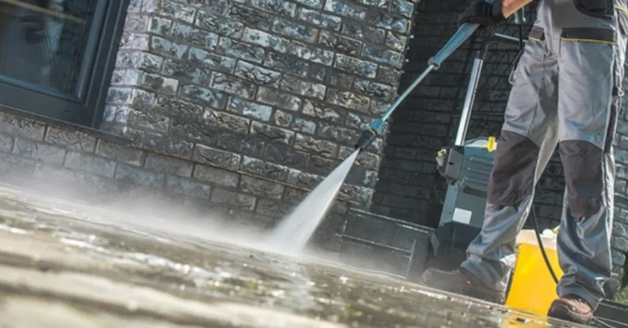 cleaning concrete with a pressure washer
