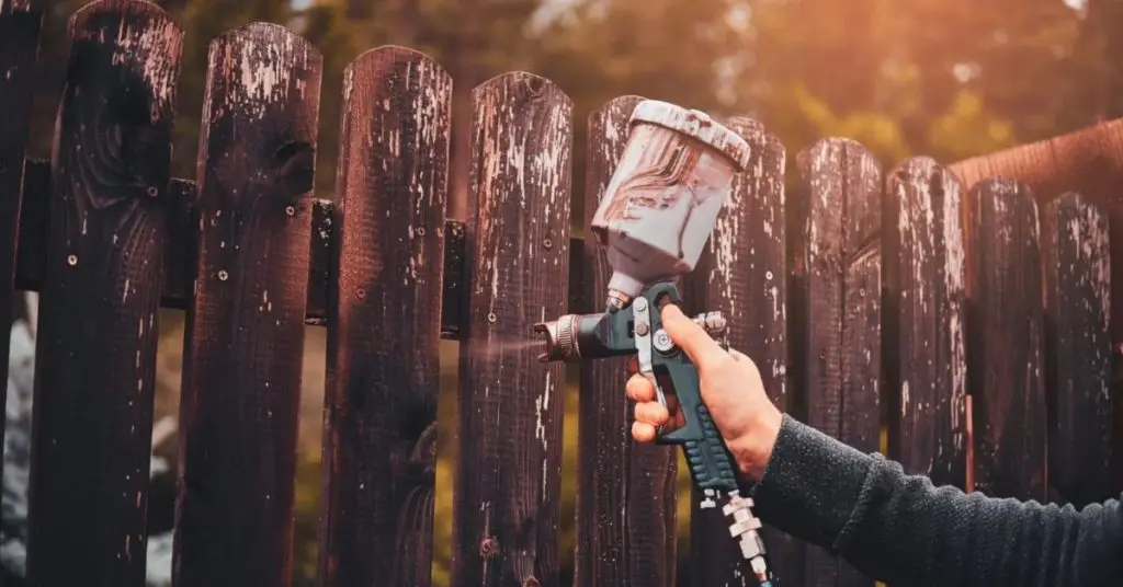 staining fence with paint sprayer