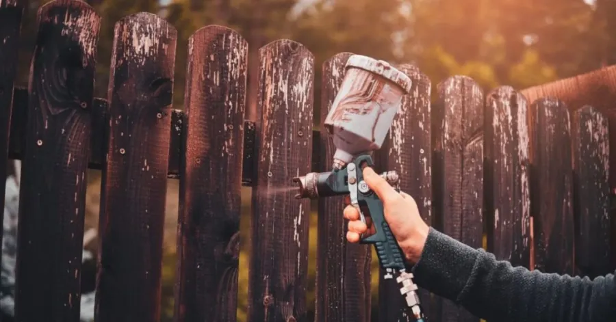 staining fence with paint sprayer