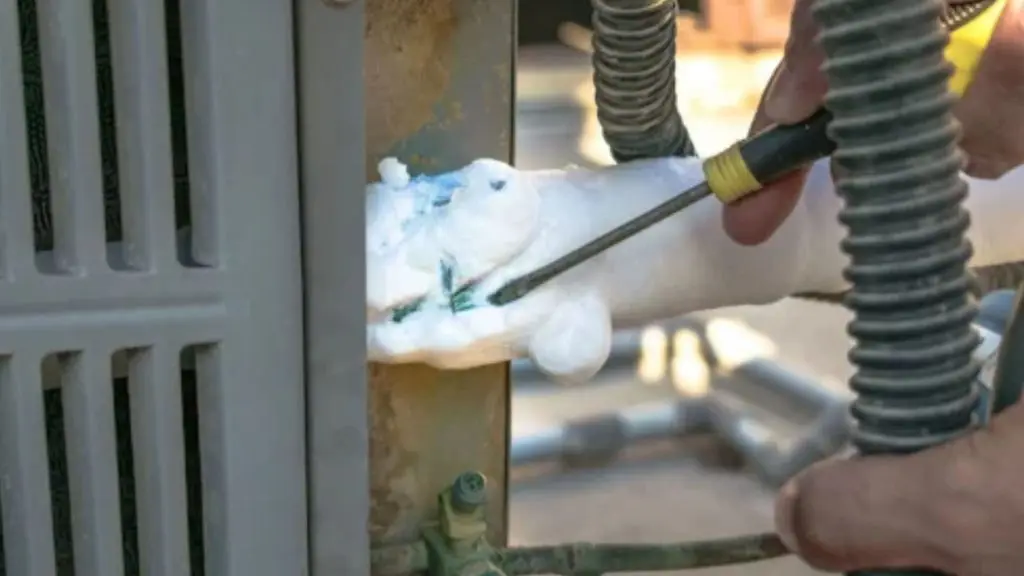 Connecting a vacuum pump hose to AC 