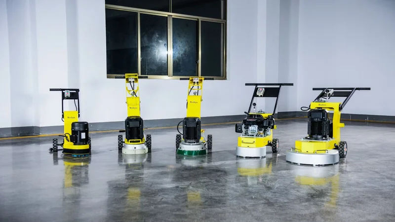 Row of concrete polishing machines on a polished floor